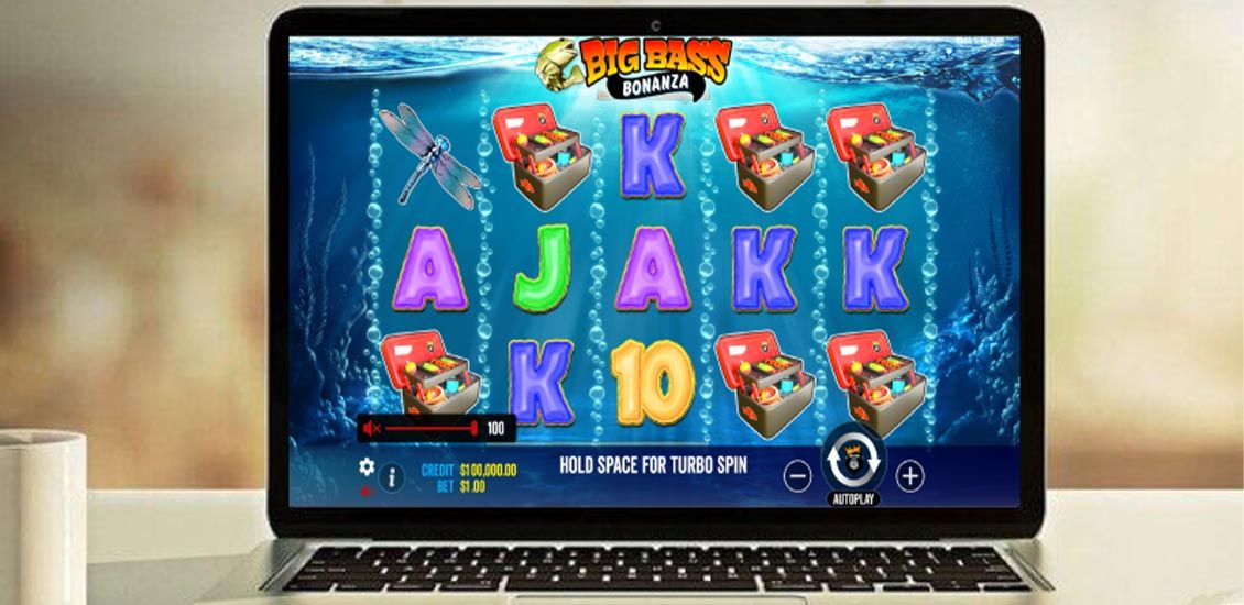 Slot Big Bass Bonanza na ekranie notebooka